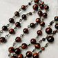 The Precious Blood Heritage Rosary – Red Tiger Eye & Gunmetal