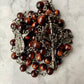 The Precious Blood Heritage Rosary – Red Tiger Eye & Gunmetal