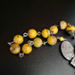 Solar Vigilance "Benedictine" Pocket Rosary:  Radiant. Fortified. Fearless.